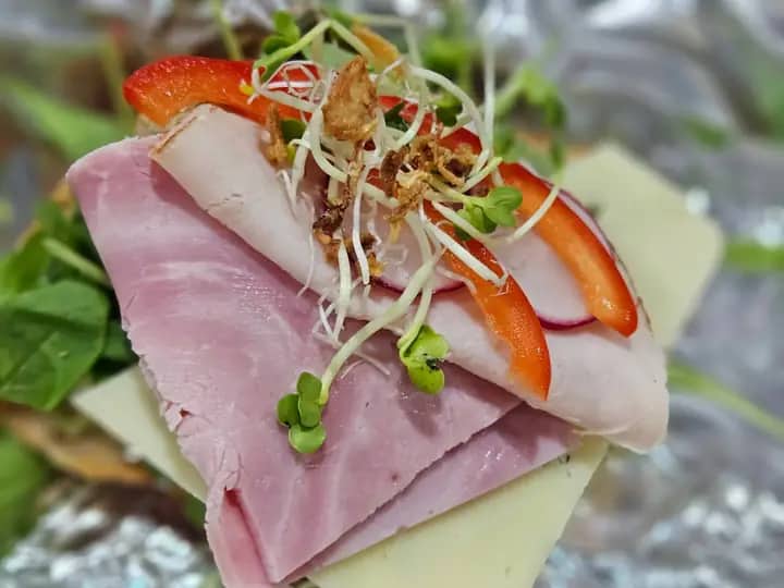 Close-up of a freshly topped canape