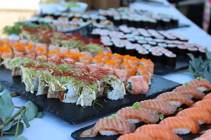 Sushi buffet with assorted rolls and nigiri